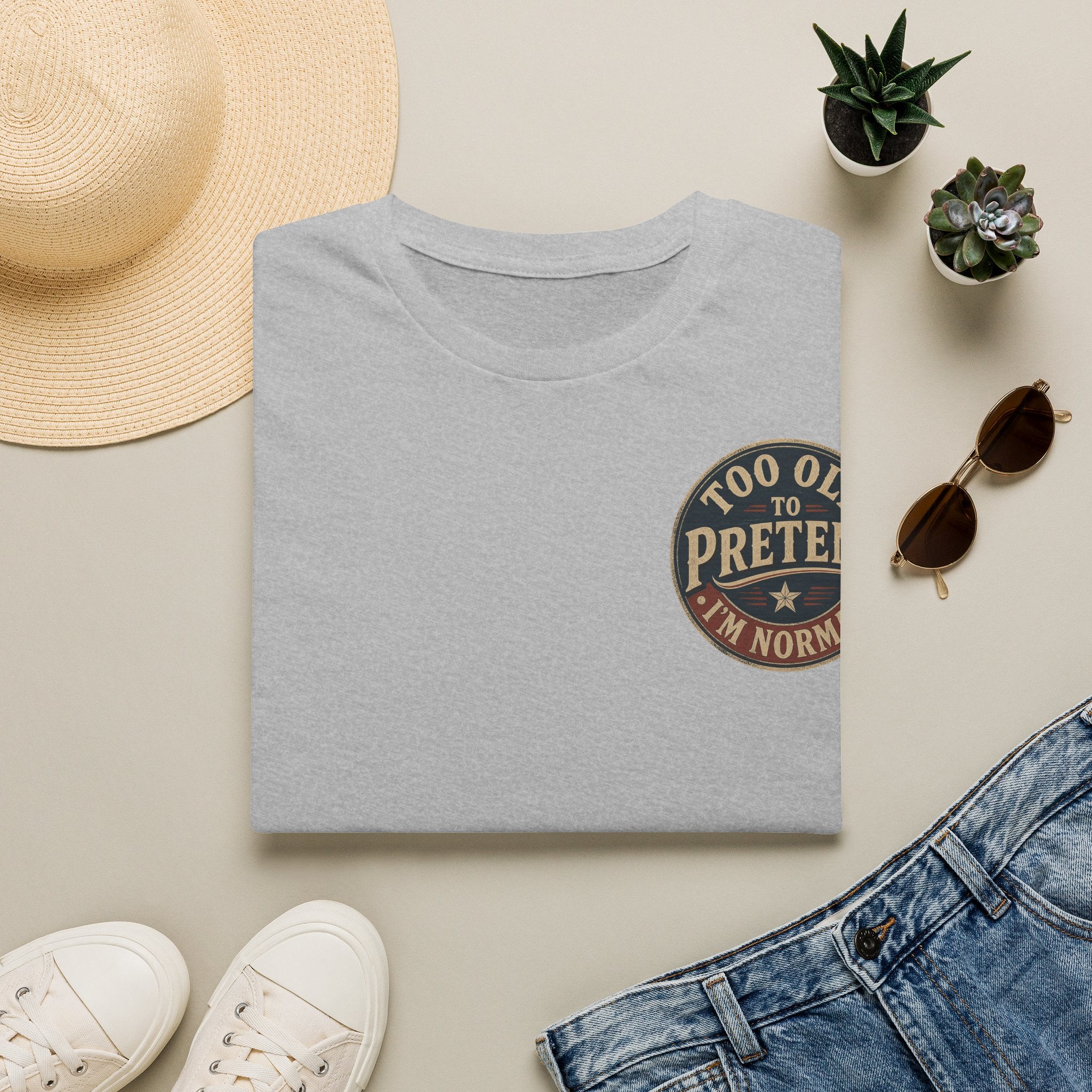 T-Shirt — "Too Old to Pretend I'm Normal" Vintage Badge Tee