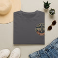 T-Shirt — "Too Old to Pretend I'm Normal" Vintage Badge Tee